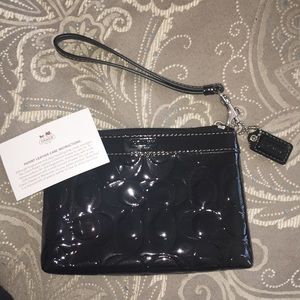 Black patent leather coach wristlet